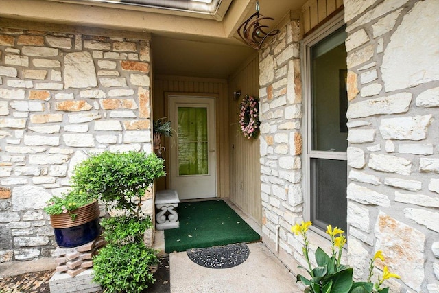 8518 Fathom Cir Unit 107, Austin, TX 78750 - entrance to property featuring stone siding