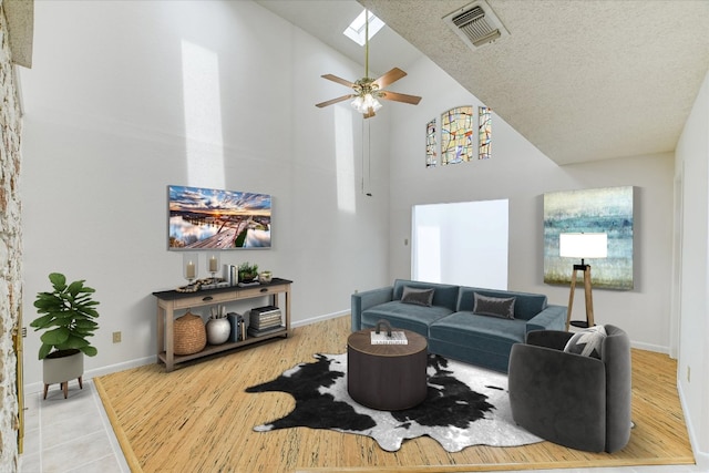 8518 Fathom Cir Unit 107, Austin, TX 78750 - living area featuring high vaulted ceiling, ceiling fan, baseboards, and wood finished floors