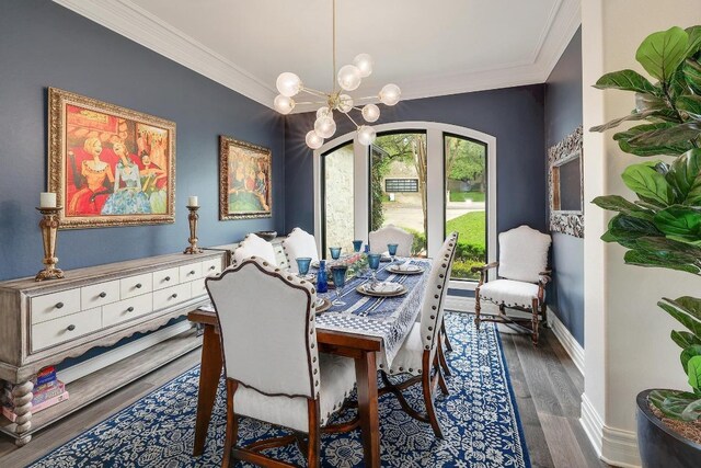 3705 Dogwood Creek Cv, Austin, TX 78746 - dining space with ornamental molding, a chandelier, and wood finished floors