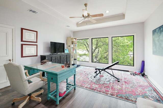 3705 Dogwood Creek Cv, Austin, TX 78746 - home office featuring a raised ceiling, wood finished floors, a ceiling fan, recessed lighting, and crown molding
