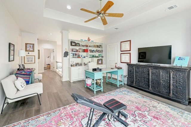3705 Dogwood Creek Cv, Austin, TX 78746 - office space featuring a raised ceiling, wood finished floors, ceiling fan, crown molding, and recessed lighting