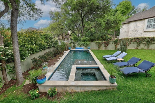 3705 Dogwood Creek Cv, Austin, TX 78746 - view of swimming pool with a fenced backyard and an in-ground hot tub