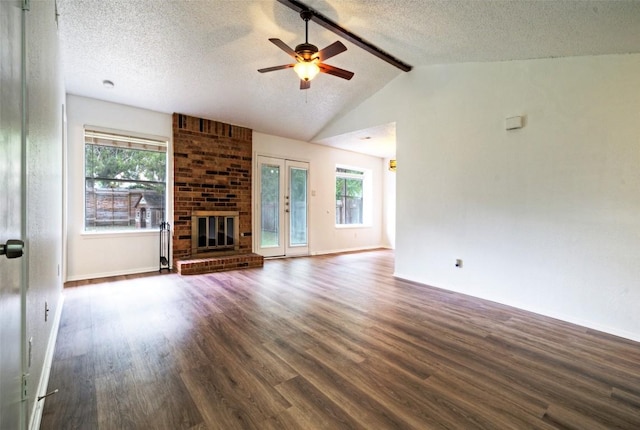 unfurnished living room with baseboards, a ceiling fan, and wood finished floors