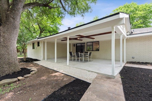 view of patio featuring a ceiling fan