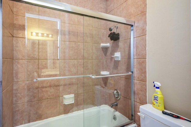 2802 Nueces St Unit 312, Austin, TX 78705 - full bathroom with toilet and combined bath / shower with glass door