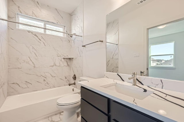 bathroom with visible vents, shower / washtub combination, vanity, toilet, and marble finish floor