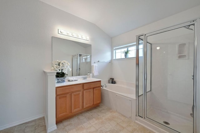 full bath featuring a garden tub, lofted ceiling, vanity, and a shower stall