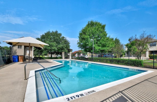 9201 Brodie Ln Unit 2001, Austin, TX 78748 - community pool featuring a patio area