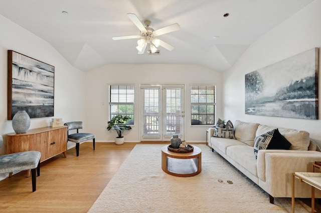 9201 Brodie Ln Unit 2001, Austin, TX 78748 - living area featuring light wood-style flooring, plenty of natural light, lofted ceiling, and a ceiling fan