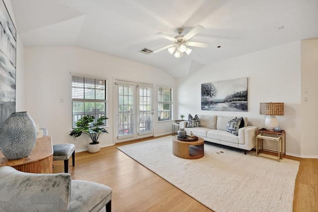 9201 Brodie Ln Unit 2001, Austin, TX 78748 - living room featuring vaulted ceiling, light wood-style flooring, and ceiling fan