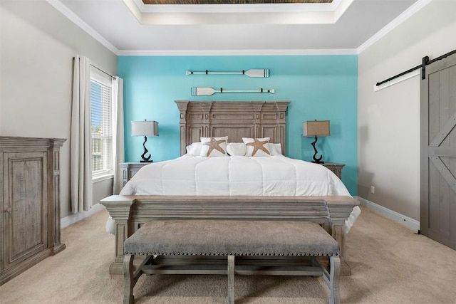 bedroom with crown molding, light colored carpet, a barn door, and a raised ceiling