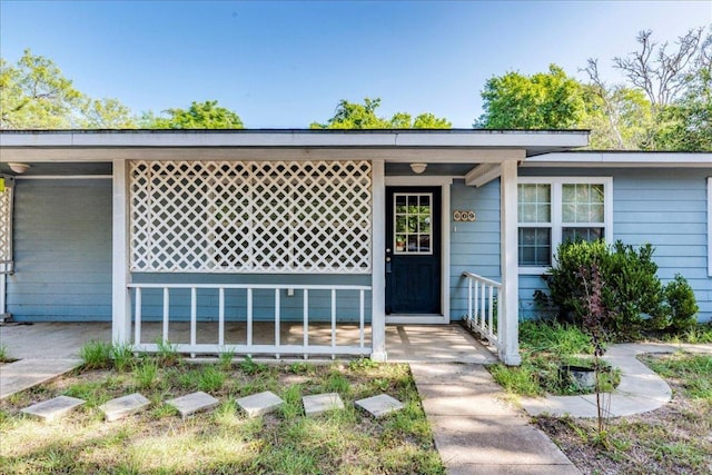 exterior space featuring covered porch