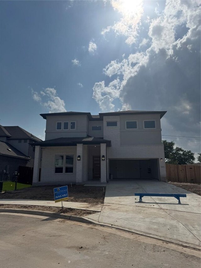 1410 Cardinal Ln, Round Rock, TX 78681 - view of front of house featuring concrete driveway and an attached garage