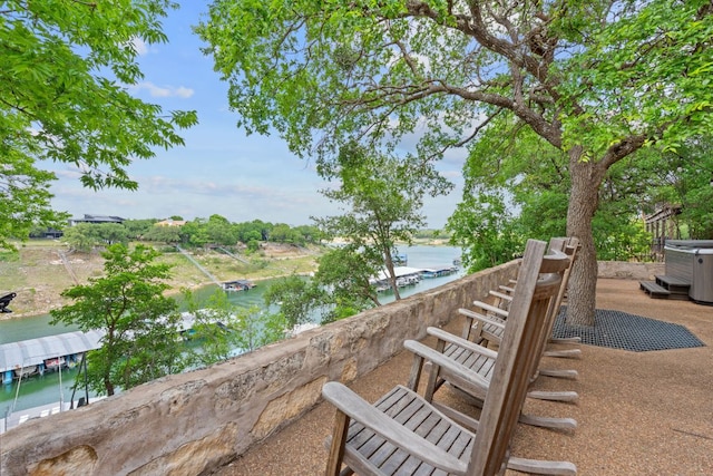 view of home's community with a water view