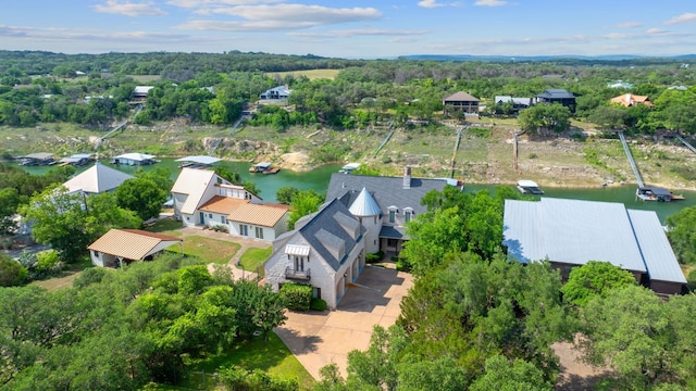 bird's eye view with a water view