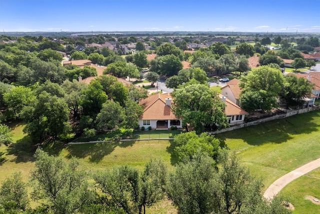 birds eye view of property with a residential view