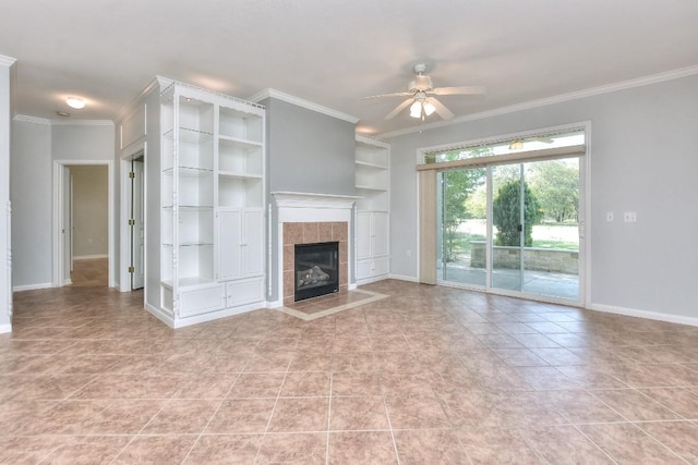 unfurnished living room featuring a tiled fireplace, a ceiling fan, baseboards, light tile patterned floors, and ornamental molding