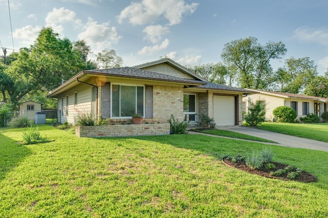 8504 Burrell Dr, Austin, TX 78757 - single story home featuring a garage, driveway, and brick siding
