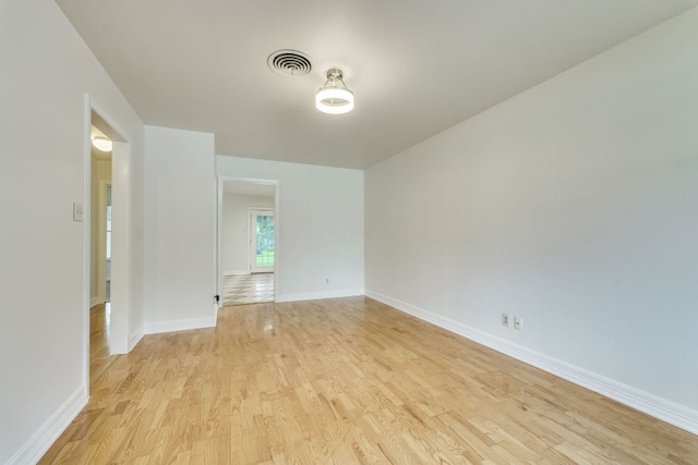 8504 Burrell Dr, Austin, TX 78757 - empty room featuring light wood finished floors and baseboards