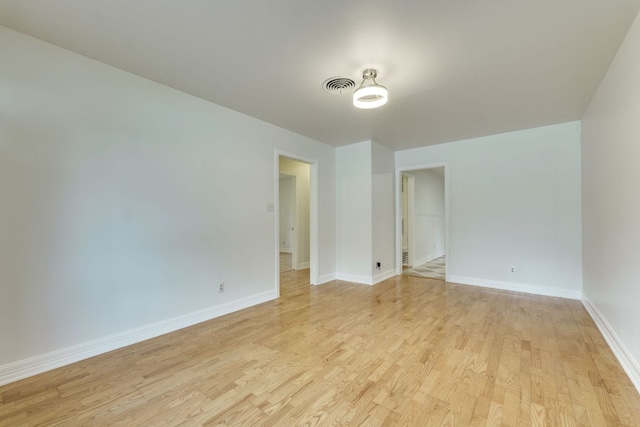 8504 Burrell Dr, Austin, TX 78757 - spare room featuring light wood-type flooring and baseboards
