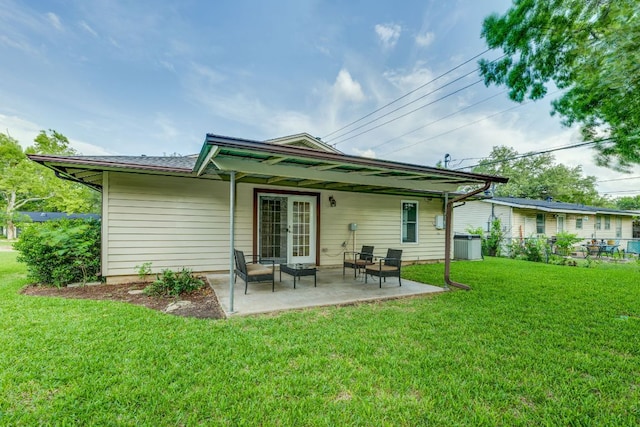 8504 Burrell Dr, Austin, TX 78757 - back of house with a yard and a patio