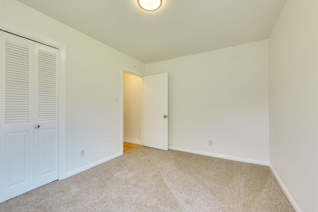 8504 Burrell Dr, Austin, TX 78757 - unfurnished bedroom featuring light colored carpet and a closet