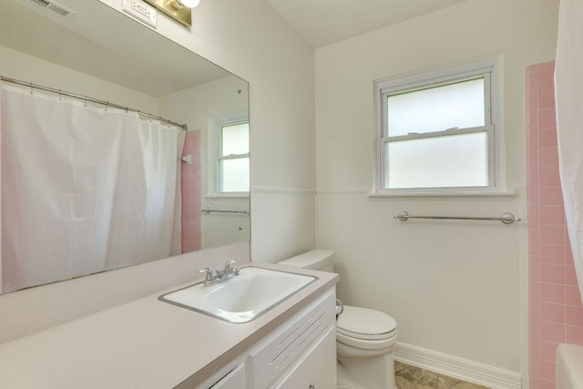 8504 Burrell Dr, Austin, TX 78757 - full bathroom featuring vanity, a shower with shower curtain, and a tub