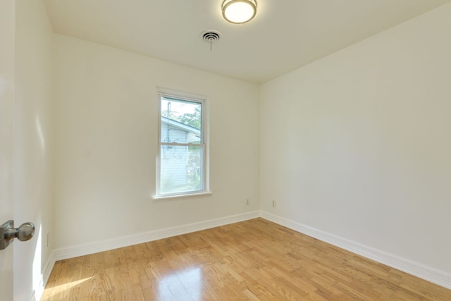 8504 Burrell Dr, Austin, TX 78757 - empty room featuring light wood-style floors and baseboards