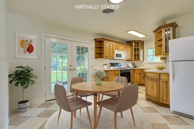 8504 Burrell Dr, Austin, TX 78757 - dining room featuring french doors
