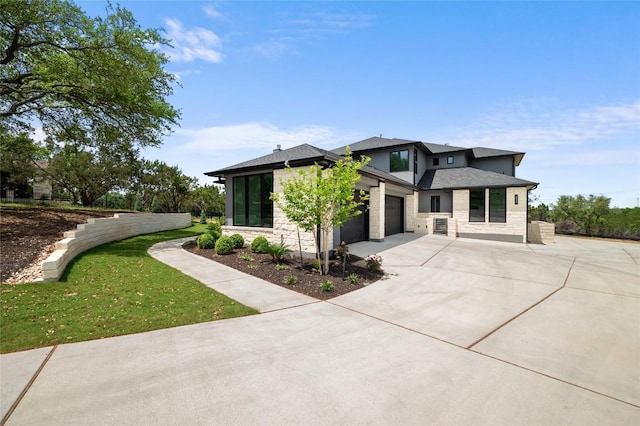 3202 Winding Creek Cv, Austin, TX 78735 - view of front of property with stone siding, driveway, an attached garage, and a shingled roof