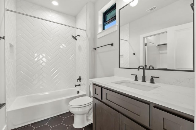 full bath featuring washtub / shower combination, vanity, toilet, tile patterned floors, and visible vents