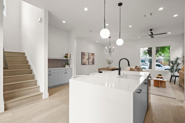 6110 Atwood St Unit 1, Austin, TX 78741 - kitchen with recessed lighting, visible vents, a sink, and light wood finished floors