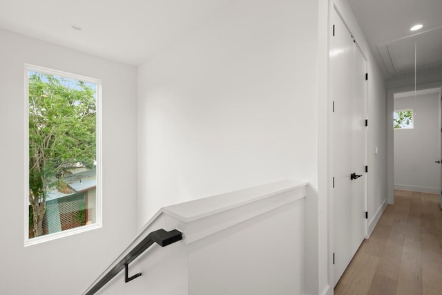 6110 Atwood St Unit 1, Austin, TX 78741 - corridor with recessed lighting, baseboards, light wood-style flooring, and attic access