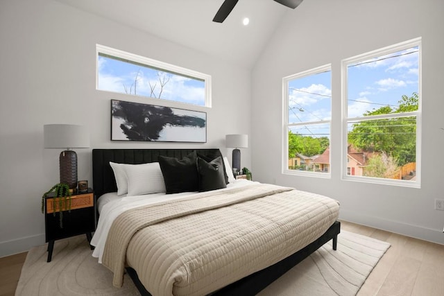 6110 Atwood St Unit 1, Austin, TX 78741 - bedroom with baseboards, multiple windows, and light wood-type flooring