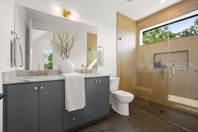 6110 Atwood St Unit 1, Austin, TX 78741 - full bathroom with a sink, two vanities, toilet, and a shower stall