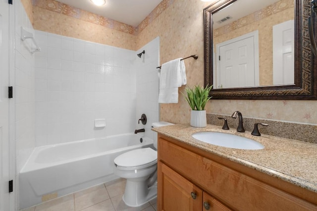 full bathroom with vanity, toilet, tile patterned floors,  shower combination, and visible vents