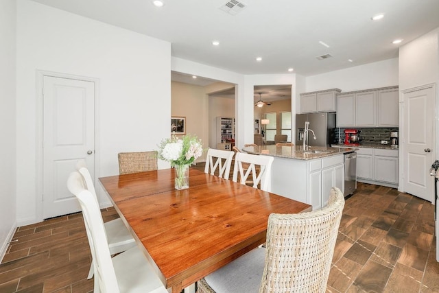 2229 Sauterne Dr, Leander, TX 78641 - dining room with recessed lighting, ceiling fan, and visible vents