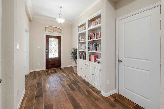 2229 Sauterne Dr, Leander, TX 78641 - entryway featuring dark wood-style flooring, baseboards, and ornamental molding