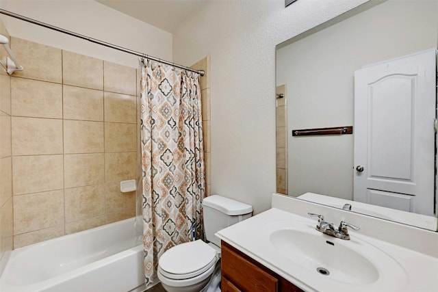 full bathroom with vanity, shower / tub combo with curtain, and toilet