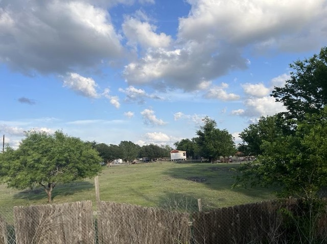 9507 Capitol View Dr, Austin, TX 78747 - view of yard featuring fence and a rural view