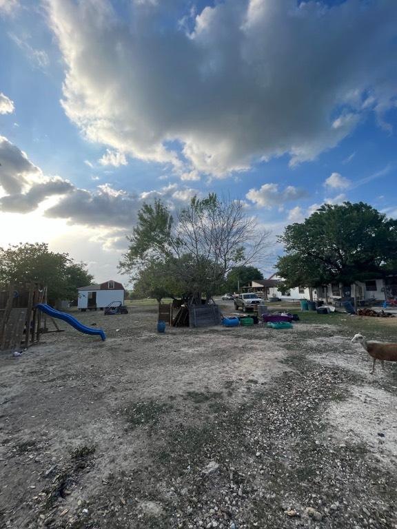 9507 Capitol View Dr, Austin, TX 78747 - view of yard featuring playground community