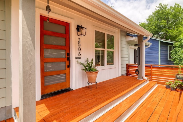 wooden terrace with covered porch