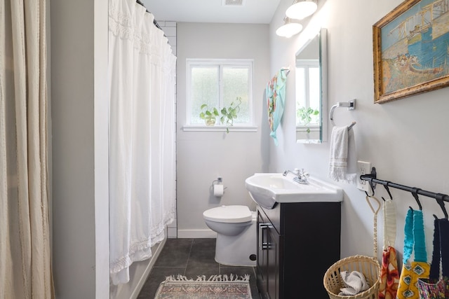 bathroom with vanity, toilet, tile patterned floors, curtained shower, and visible vents
