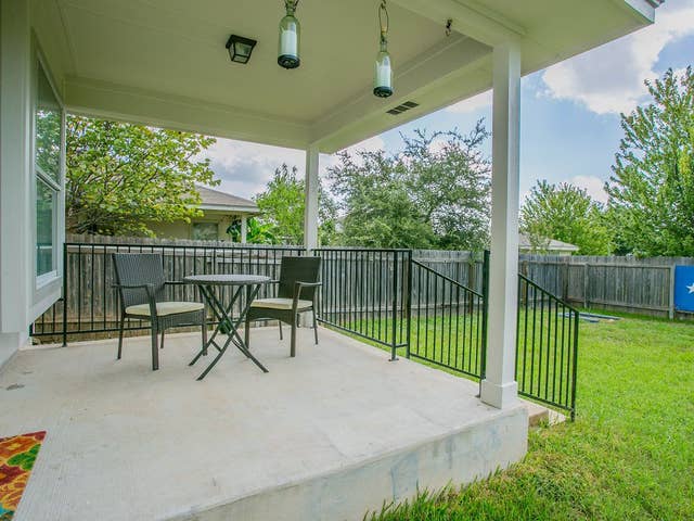 view of patio / terrace featuring a fenced backyard and visible vents