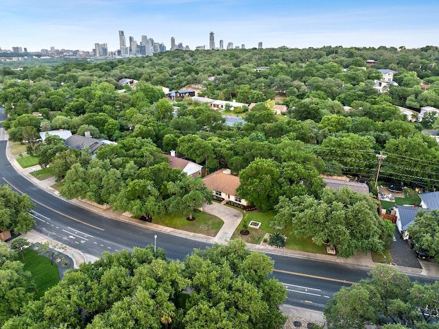 birds eye view of property with a city view