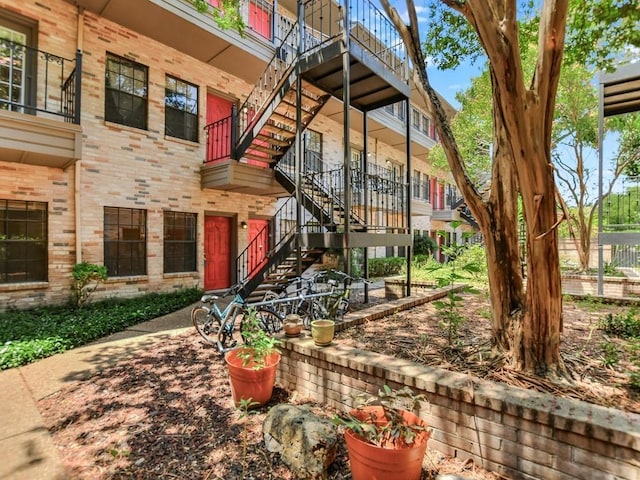 view of property featuring stairway