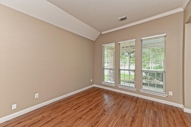 3705 Derby Trl, Round Rock, TX 78681 - unfurnished room with crown molding, wood finished floors, and lofted ceiling