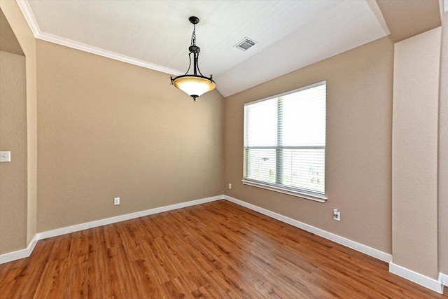3705 Derby Trl, Round Rock, TX 78681 - spare room featuring wood finished floors, ornamental molding, and lofted ceiling