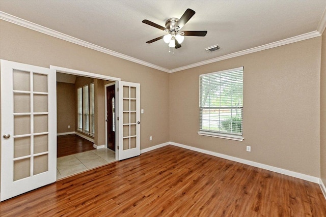 3705 Derby Trl, Round Rock, TX 78681 - unfurnished room featuring french doors, wood finished floors, ornamental molding, and ceiling fan