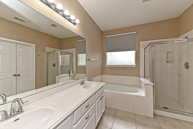 3705 Derby Trl, Round Rock, TX 78681 - full bath featuring a bath, a shower stall, tile patterned flooring, and double vanity